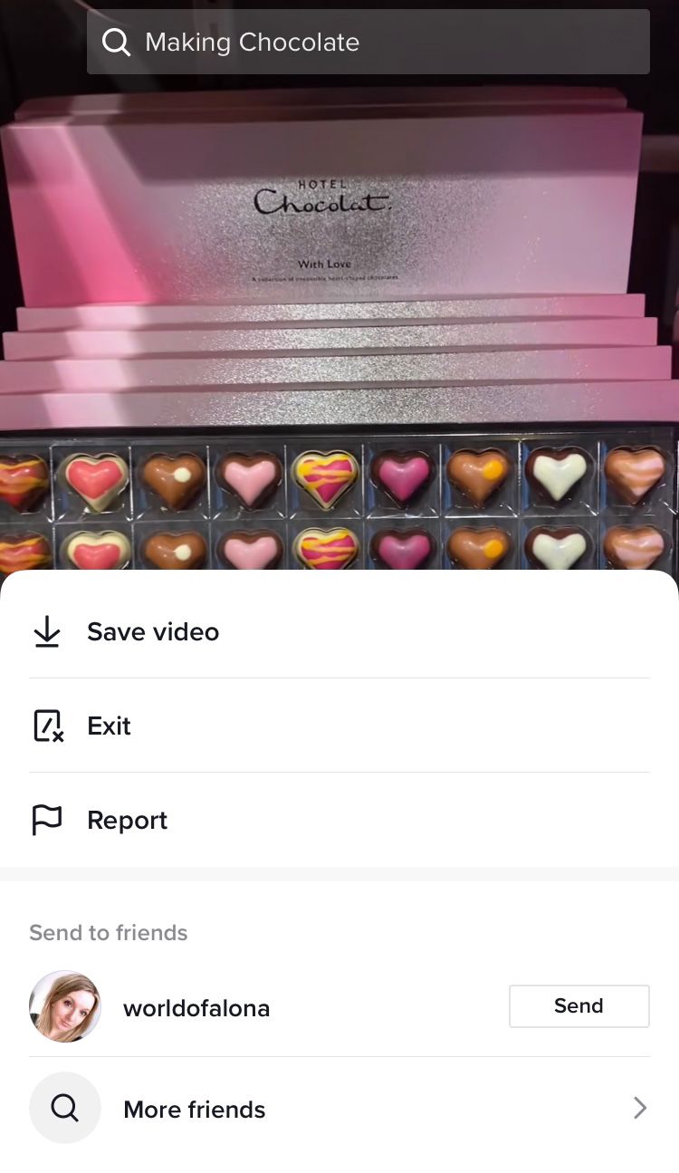 Press down on the middle of a TikTok video to reveal the hidden menu